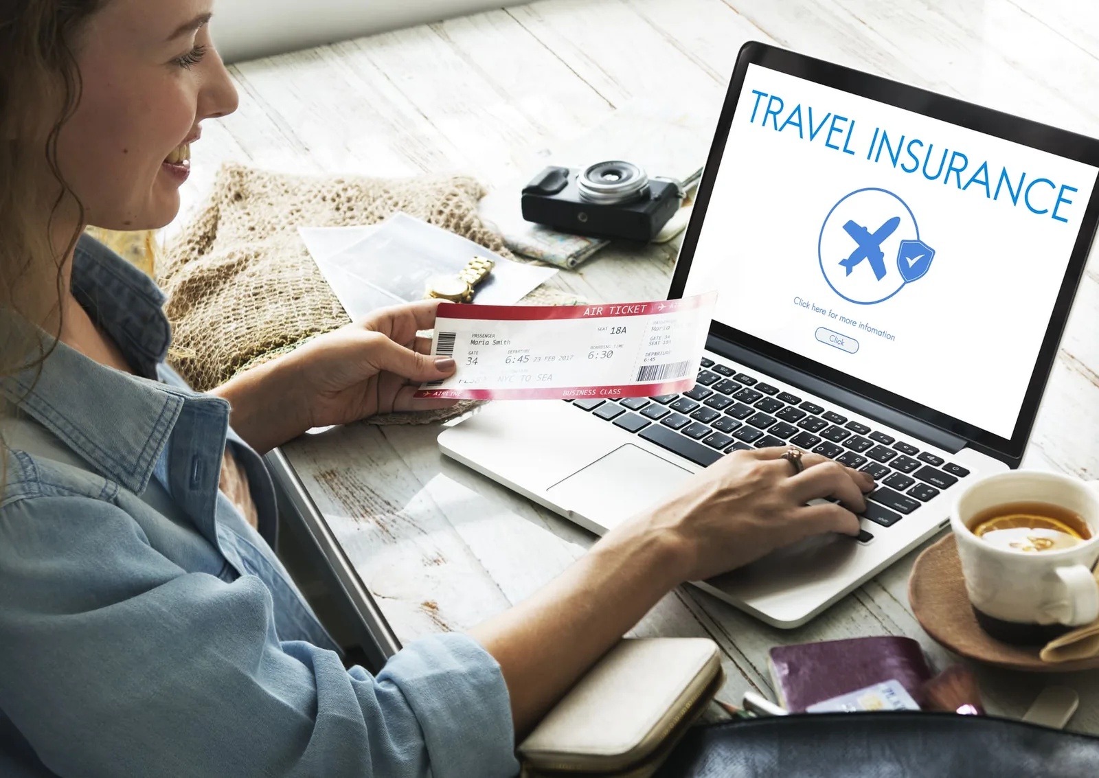 Person using laptop and planning travel